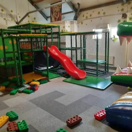 Near The With Garden And Playgroun